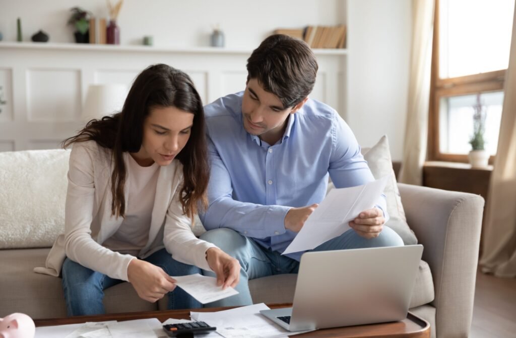 Couple researching a short sale during foreclosure