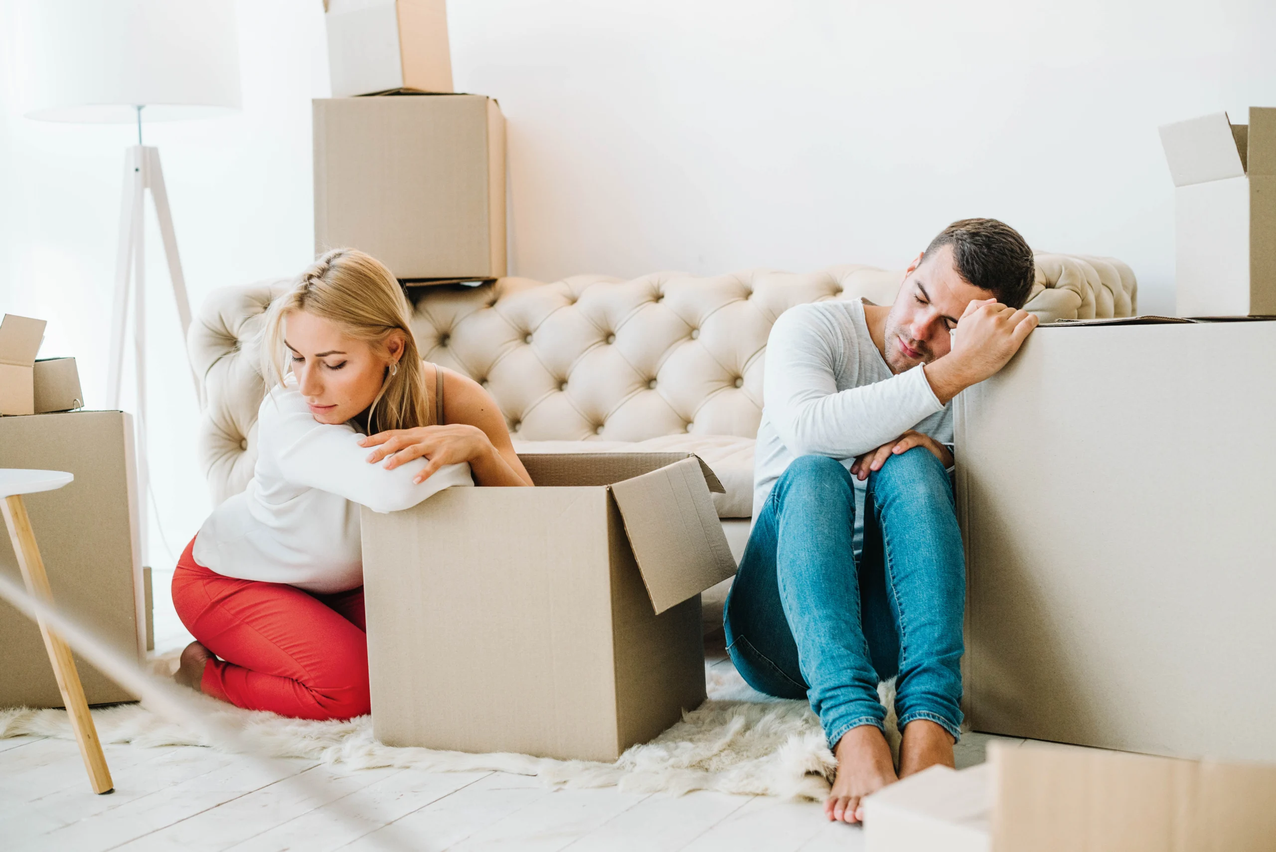 Homeowner packing boxes after learning what is a short sale